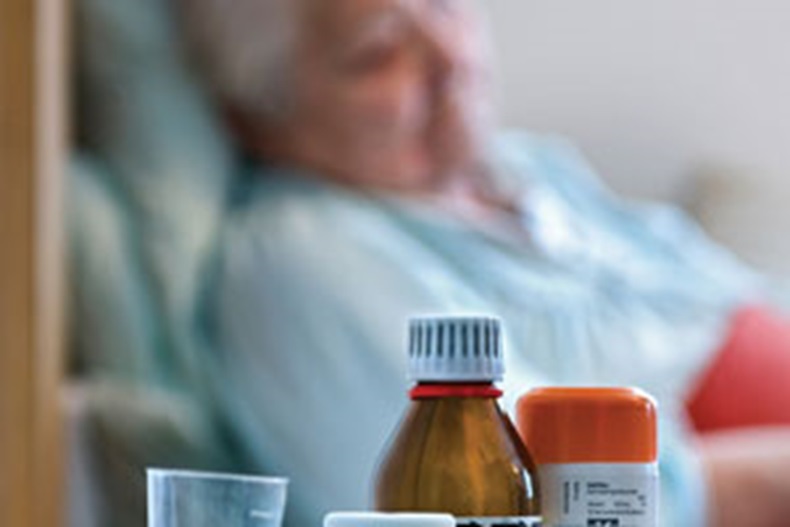 Elderly-in-bed-with-meds-3x2%20copy.jpg
