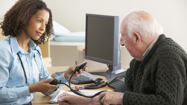 PCN pharmacist talking to elderly patient