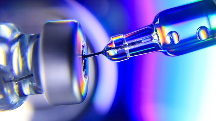 Medical concept Vaccination vaccine vial dose flu shot drug needle syringe,Lab test research science hypodermic injection treatment disease care hospital prevention immunization illness disease baby.
