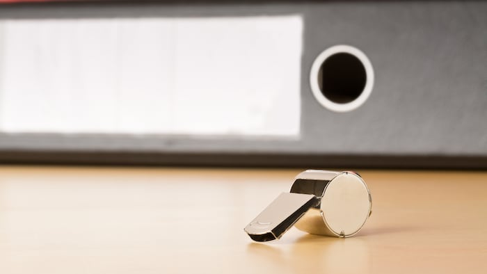 Chrome whistle on desk