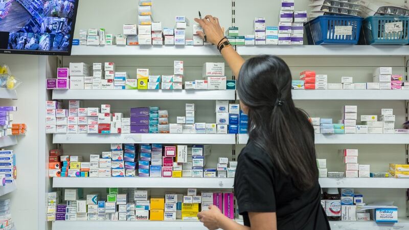 Pharmacist picking medicines, Community Pharmacy Workforce Development Group