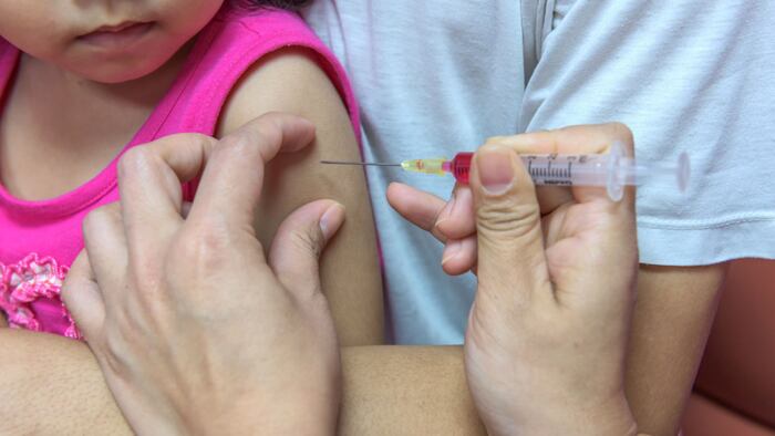 child getting jab