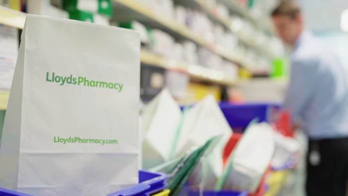 LloydsPharmacy_bag%2Bpharmacist.jpg