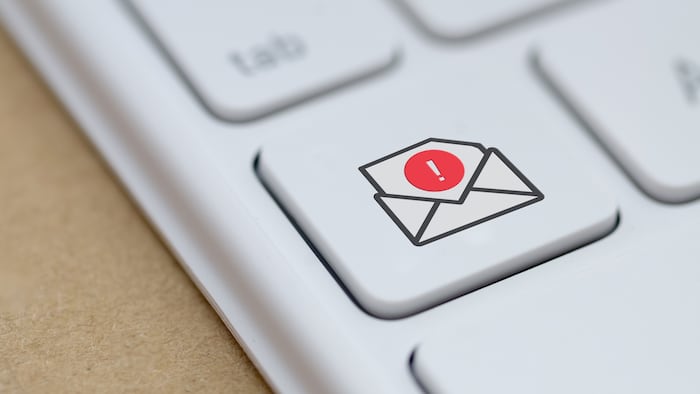 Email warning on computer keyboard