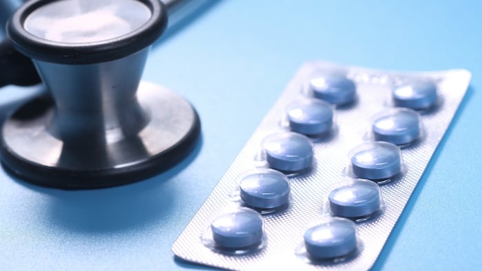 Stethoscope with blister packet of pills