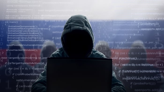 Hacker at laptop
