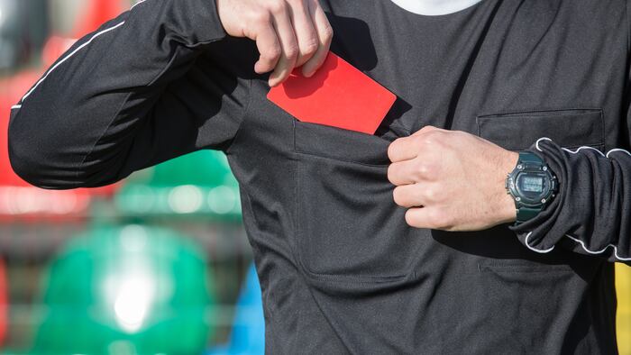 Referee with red card